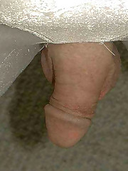 This naughty crossdresser wearing see through white panties