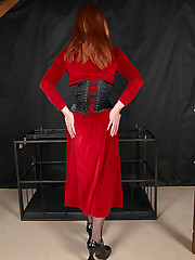 Lucimay is wearing a sexy long red dress and shows off her cock just for you
